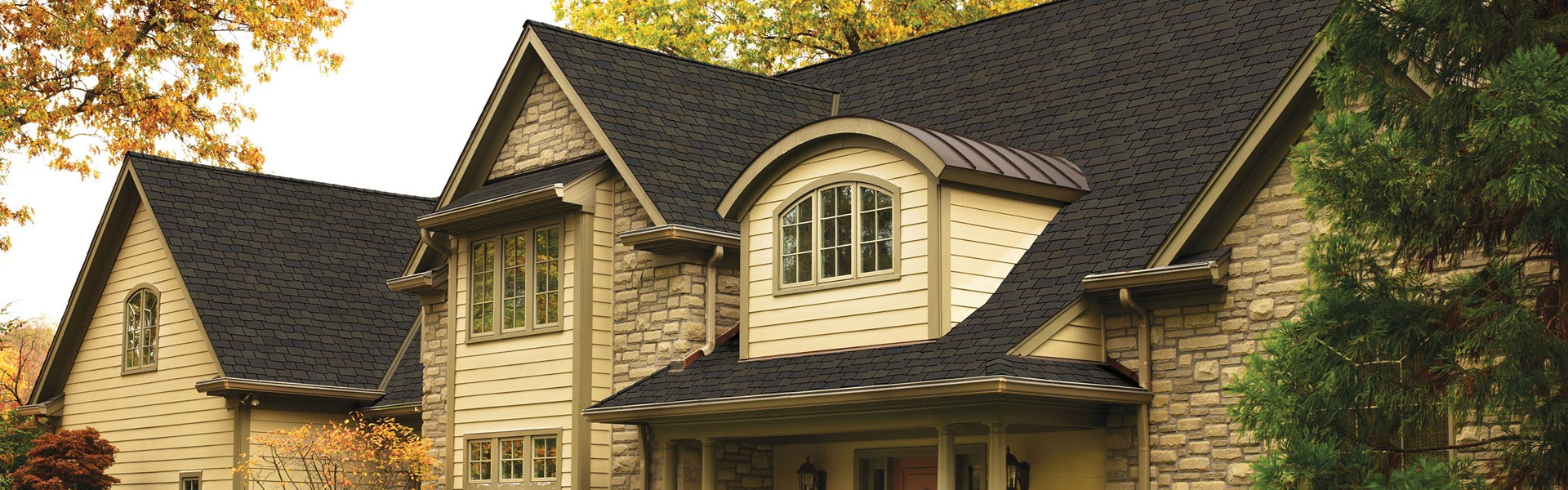 Home with a black shingle roof